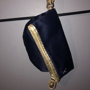 navy blue and gold clutch
